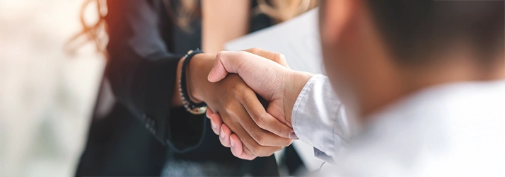Chiropractic Stratford CT Hand Shake Two people shaking hands.