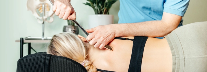 Chiropractic Stratford CT Instrument Assisted Soft Tissue Mobilization Patient receiving instrument assisted soft tissue mobilization.