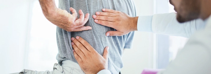 Chiropractic Stratford CT Middle Back Exam Patient receiving a back exam.