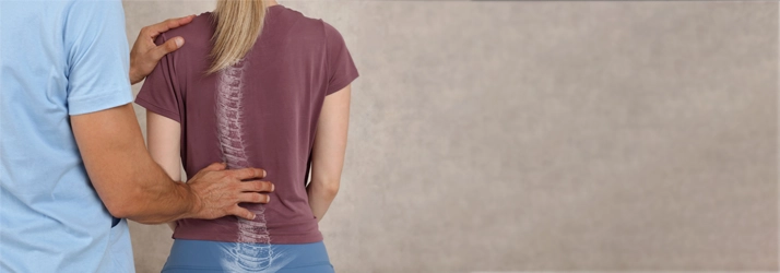 Chiropractic Stratford CT Scoliosis Patient with scoliosis receiving a back exam.